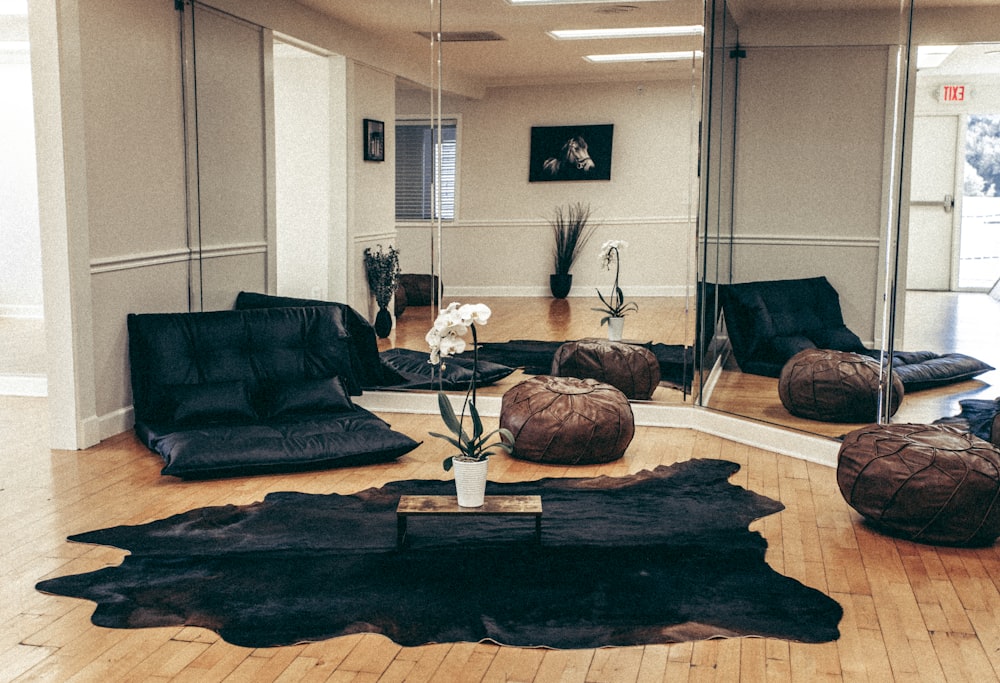 black sofa near brown wooden coffee table