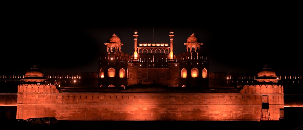 brown concrete building during night time