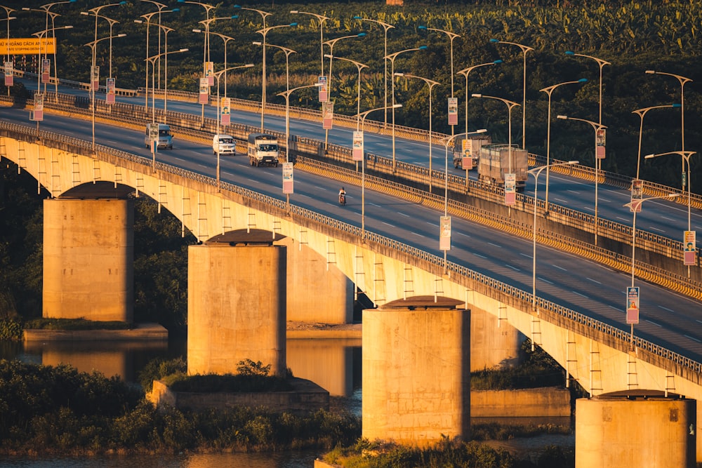 white bridge over river during daytime