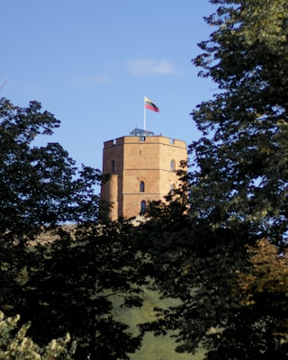 brown concrete building under blue sky during daytime