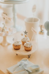 white ceramic cup on brown cupcake holder