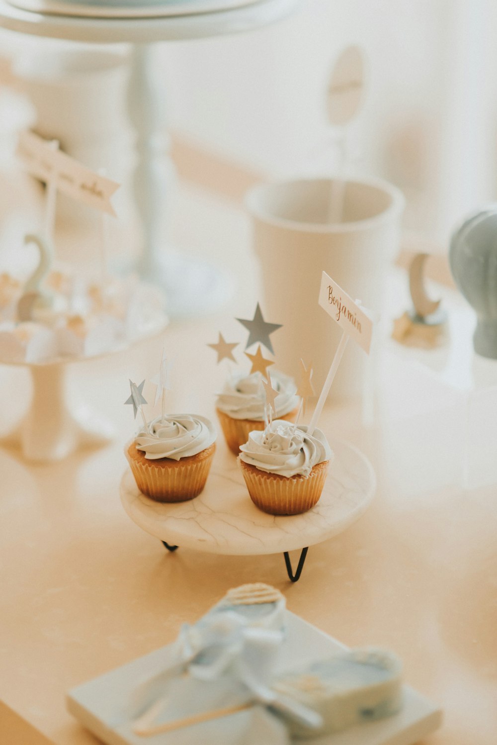 white ceramic cup on brown cupcake holder