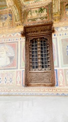 A beautifully crafted wooden window showcasing intricate details.