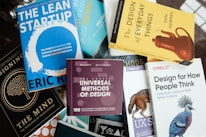 a pile of books sitting on top of a table