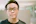man in black crew neck shirt wearing black framed eyeglasses