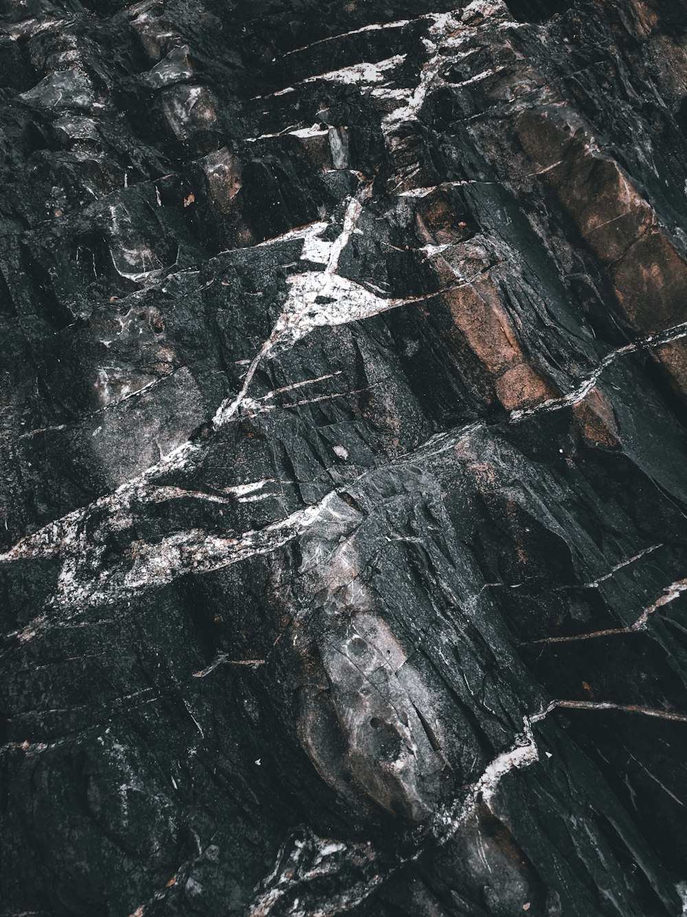 black and brown rock formation