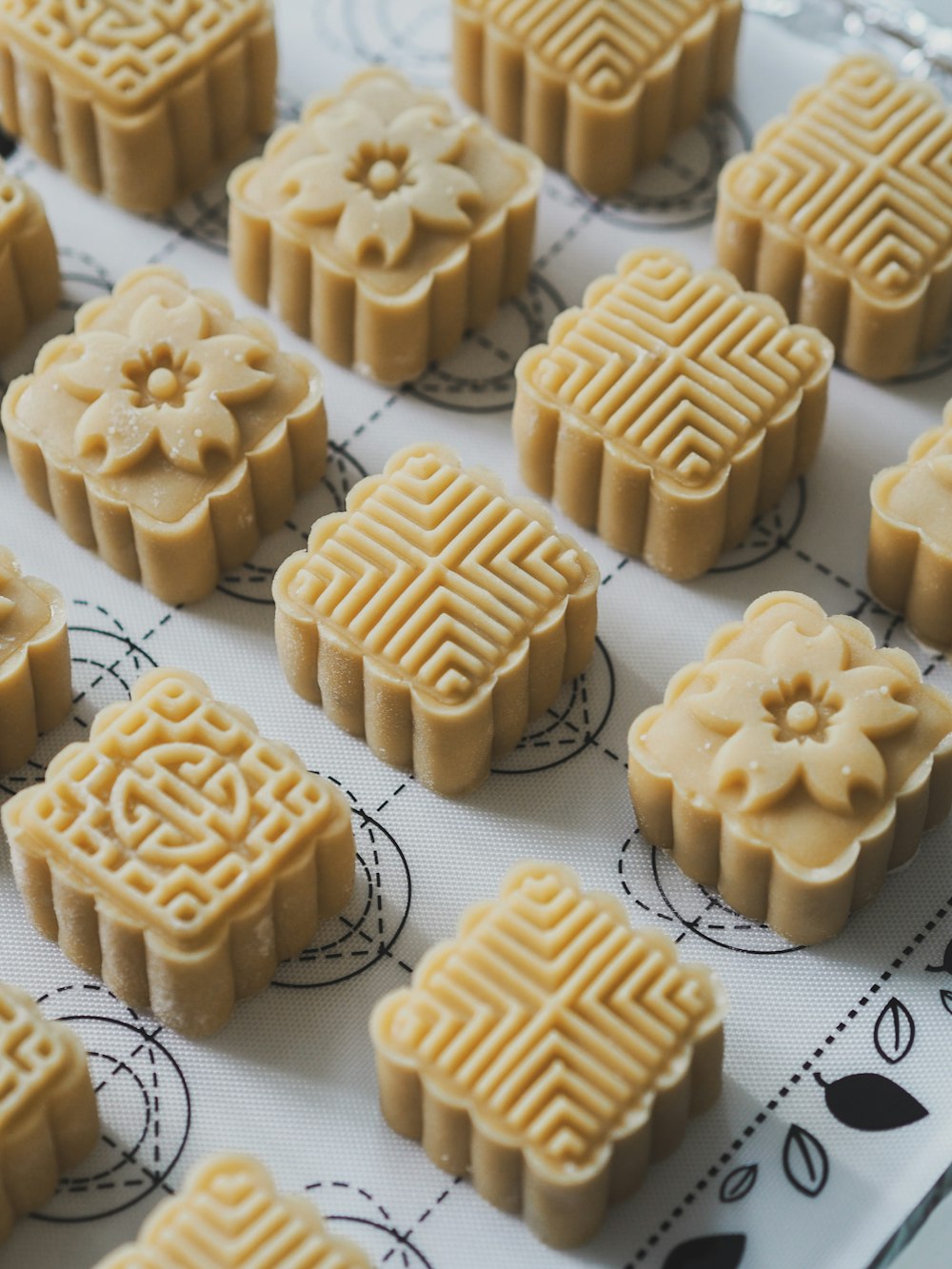 white square biscuits on white surface