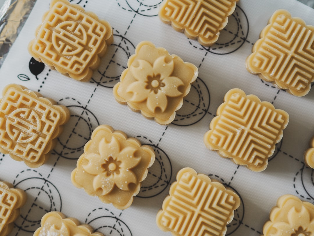 brown cookies on white surface,