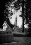 A stunning etching of a medieval church surrounded by nature.