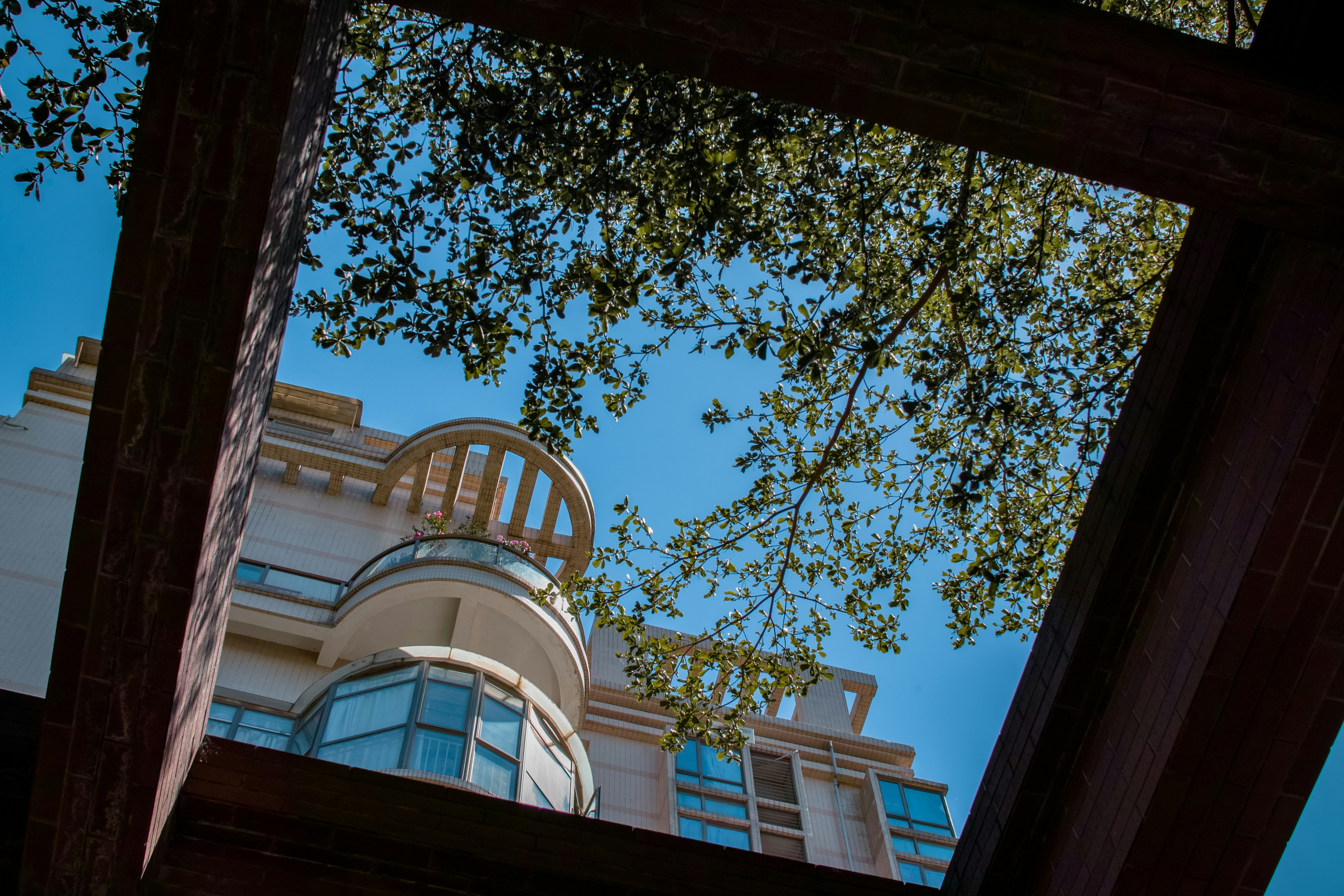 white and brown concrete building under blue sky during daytime