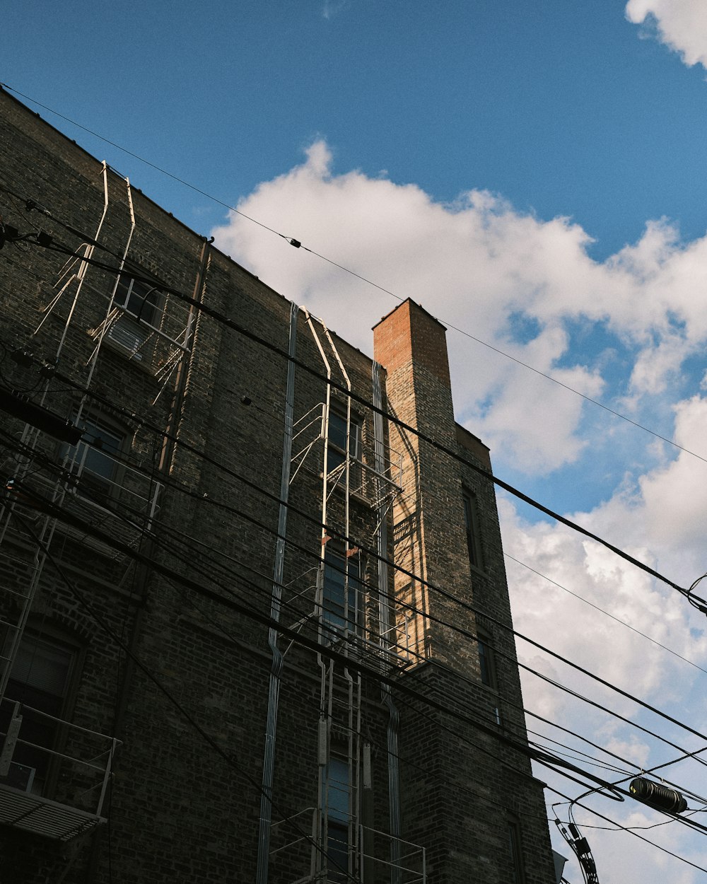 brown concrete building under blue sky during daytime