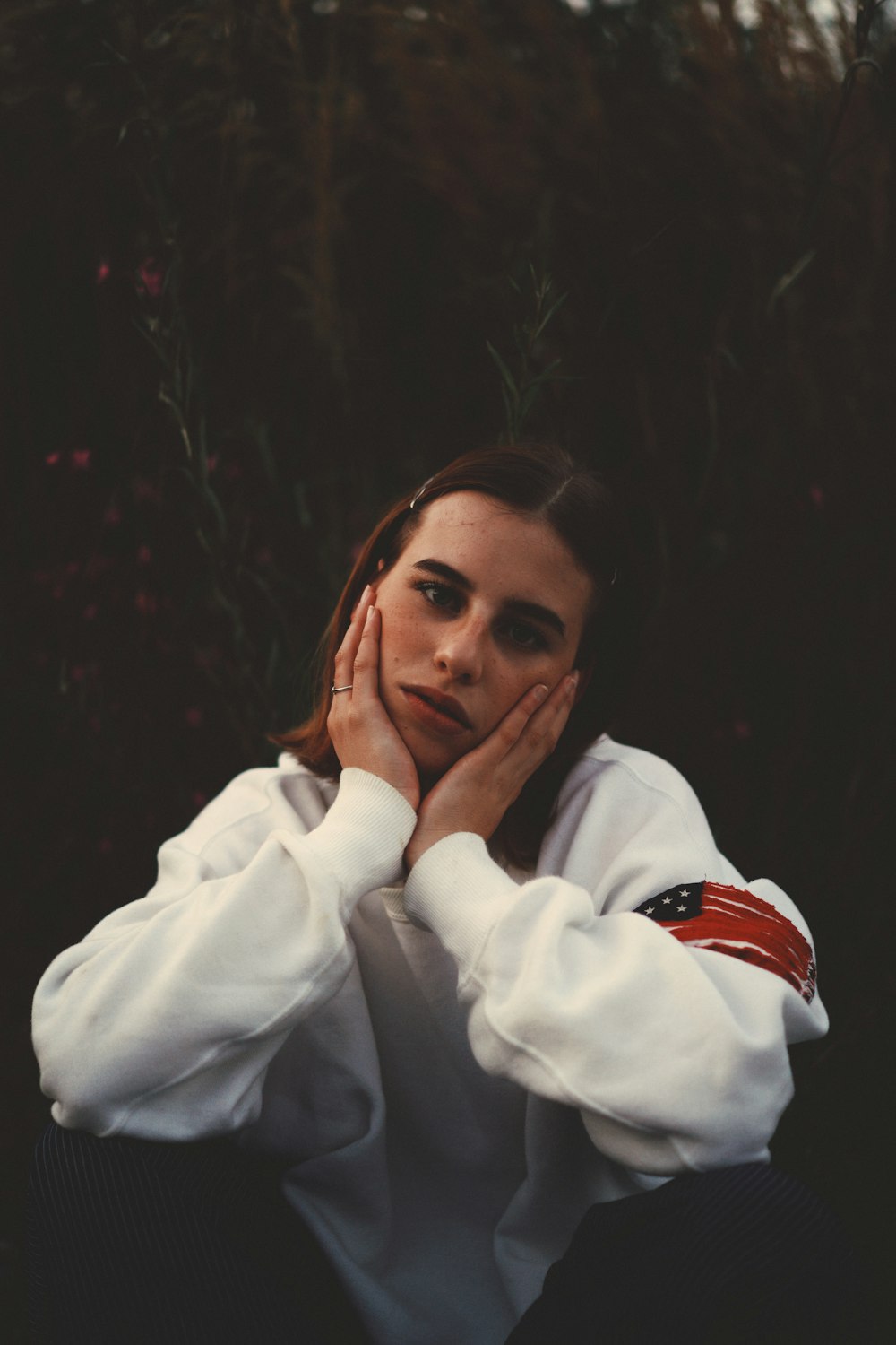 woman in white long sleeve shirt