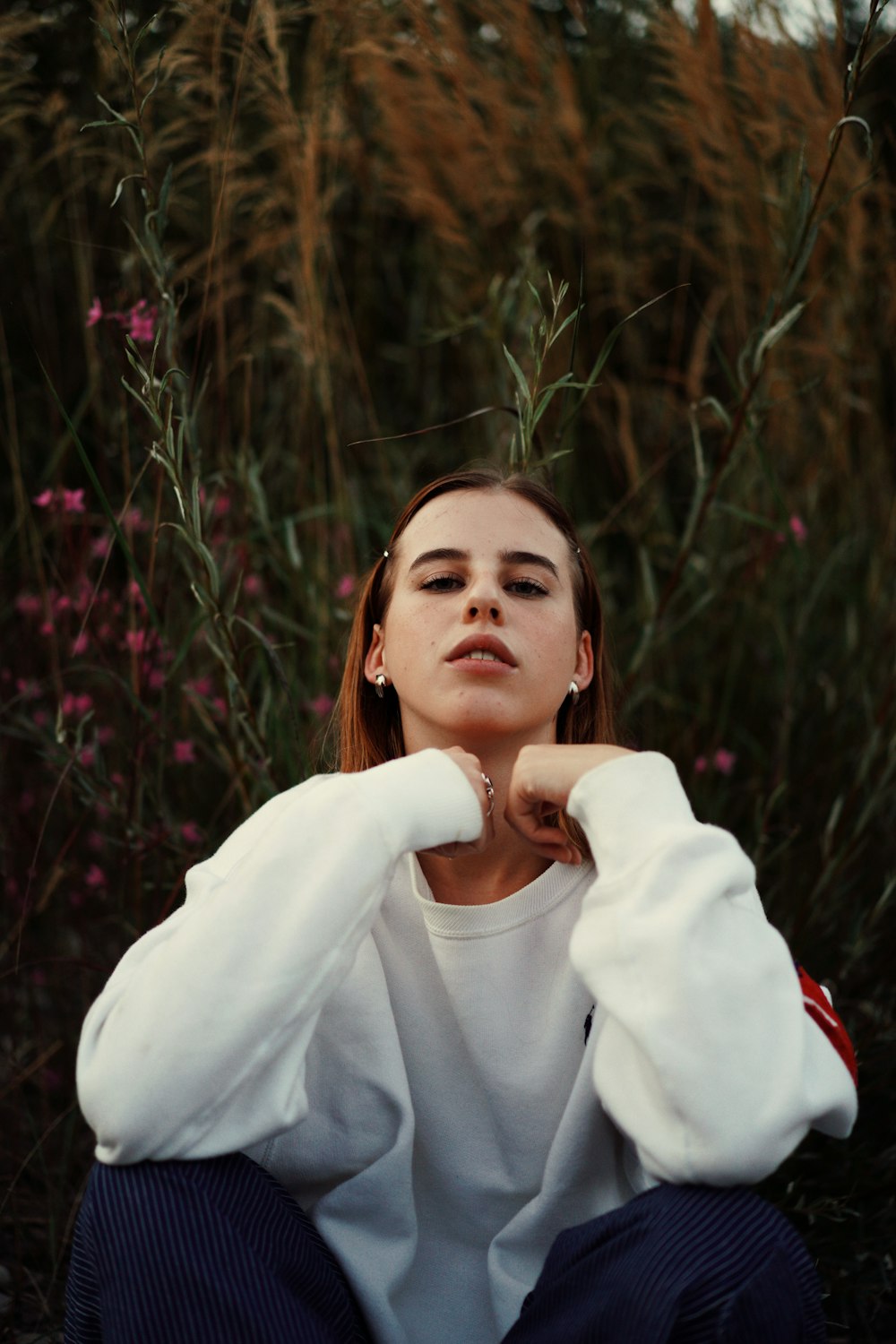 woman in white turtleneck sweater