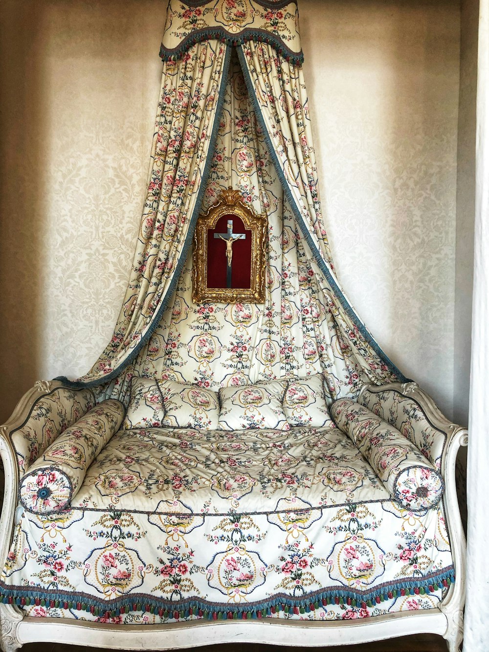 white and red floral sofa