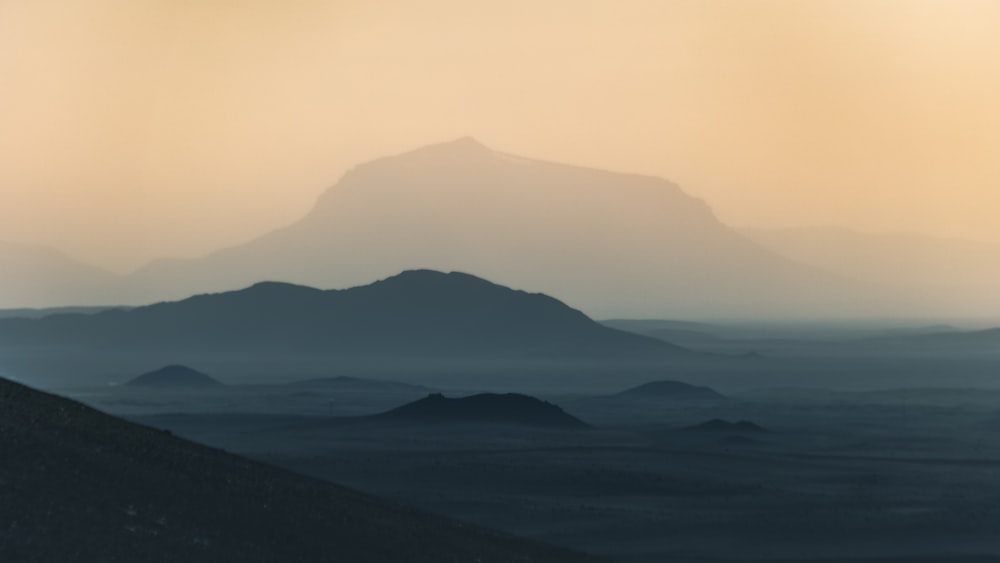 silhouette of mountains during daytime