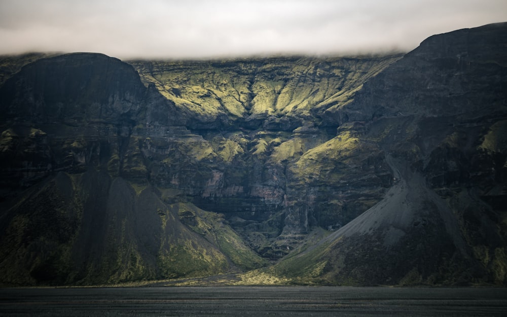 gray and white mountain under white sky during daytime