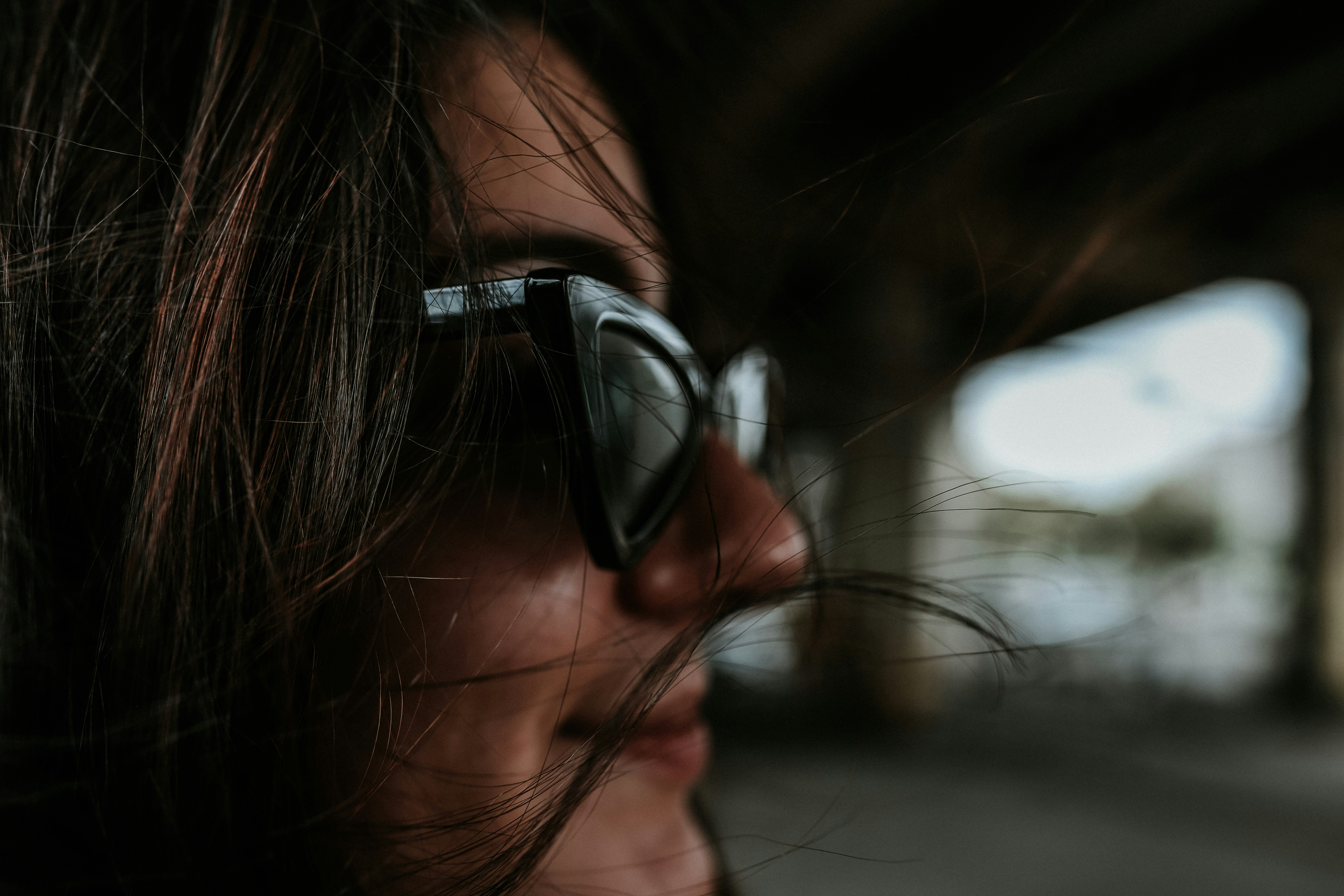 woman wearing black framed sunglasses