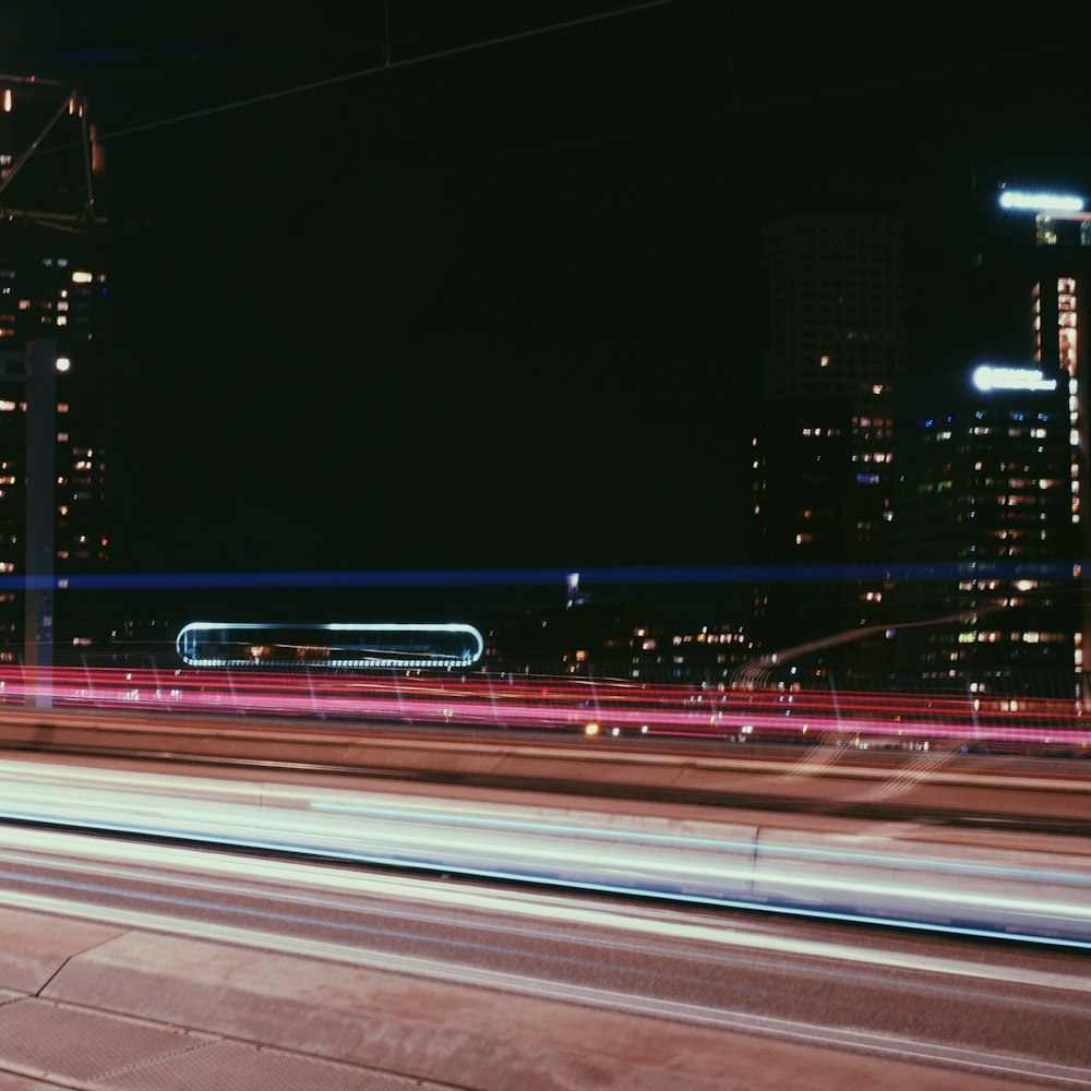 time lapse photography of cars on road during night time