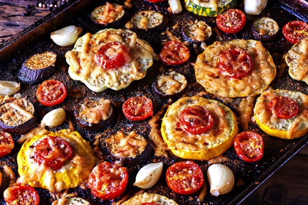 Cooked food on black plate
