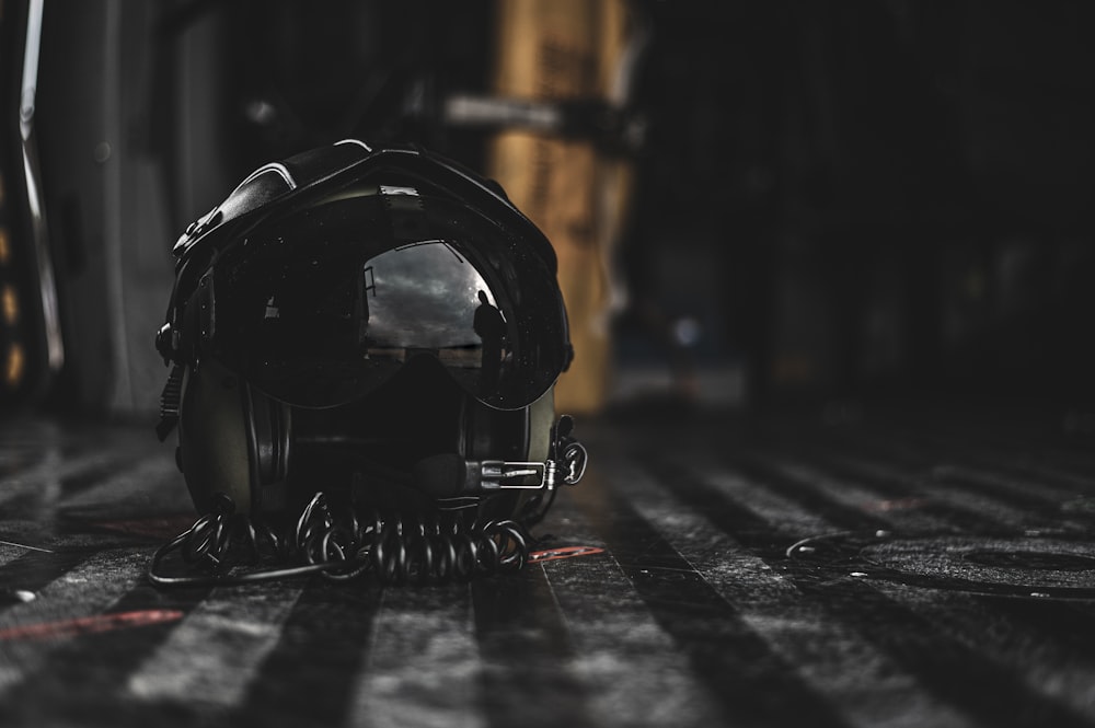 black motorcycle helmet on the floor