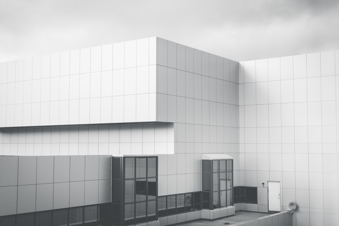 grayscale photo of concrete building