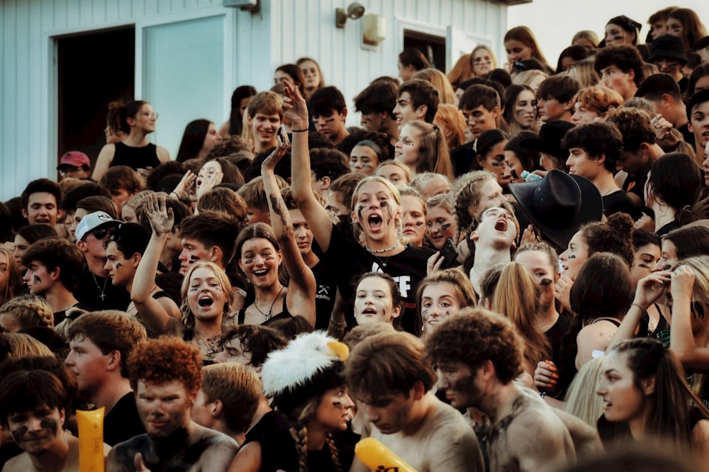 group of people standing and smiling