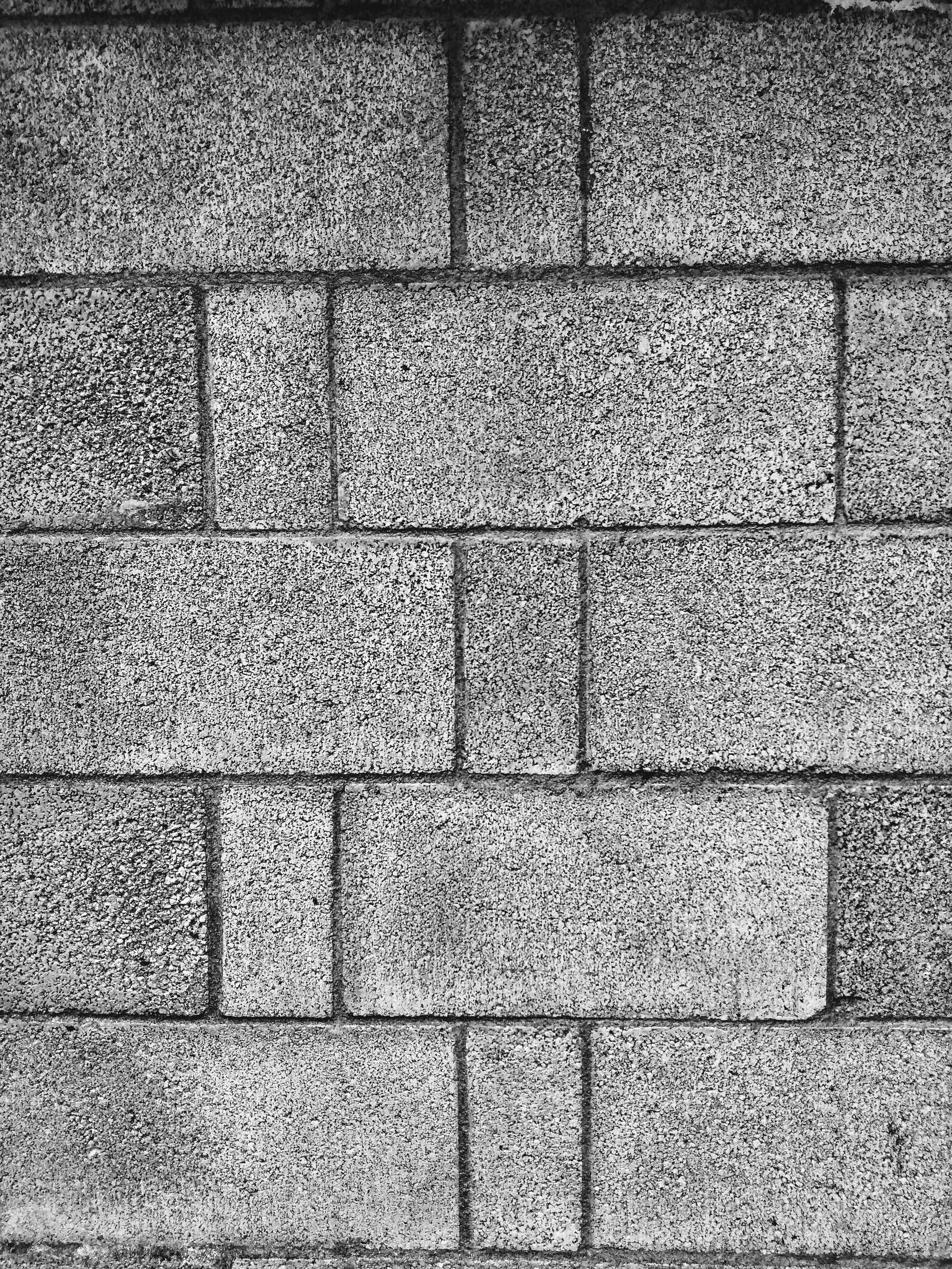 Concrete block CMU wall construction, structural masonry, grey blocks