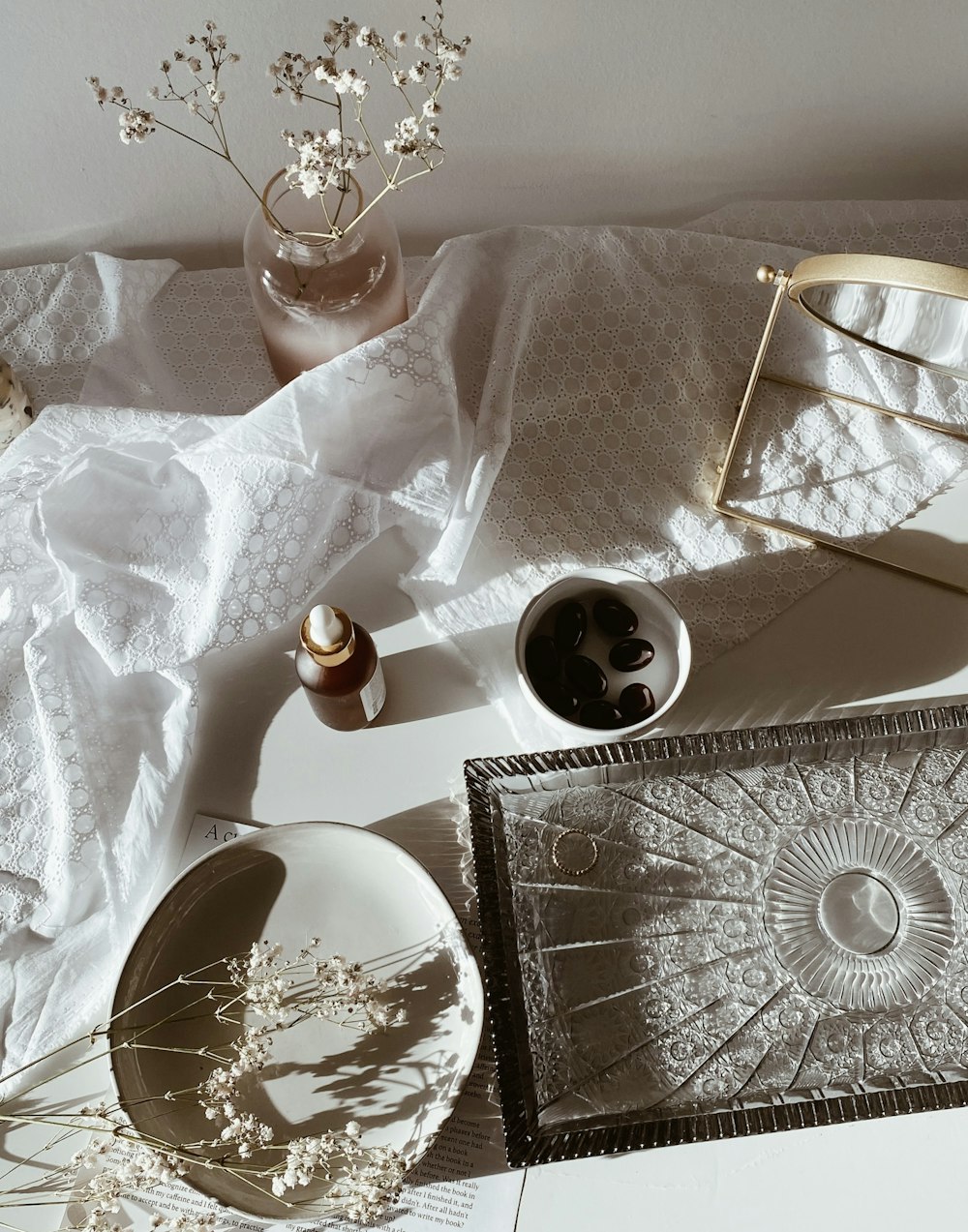 clear drinking glass on white table cloth