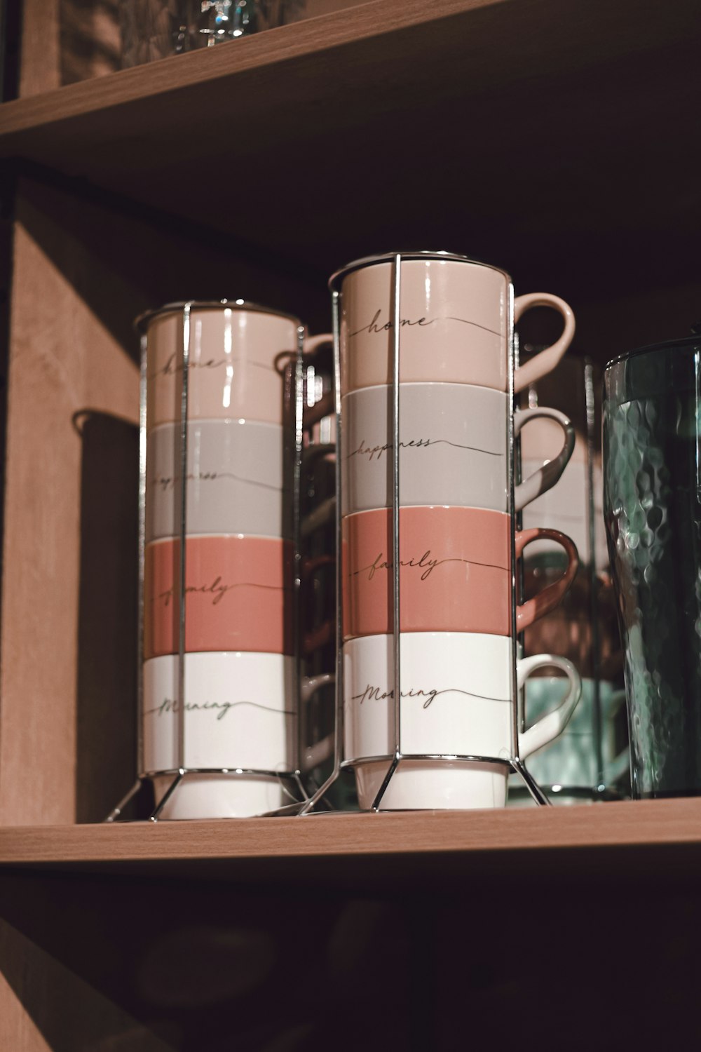 white red and black ceramic mugs
