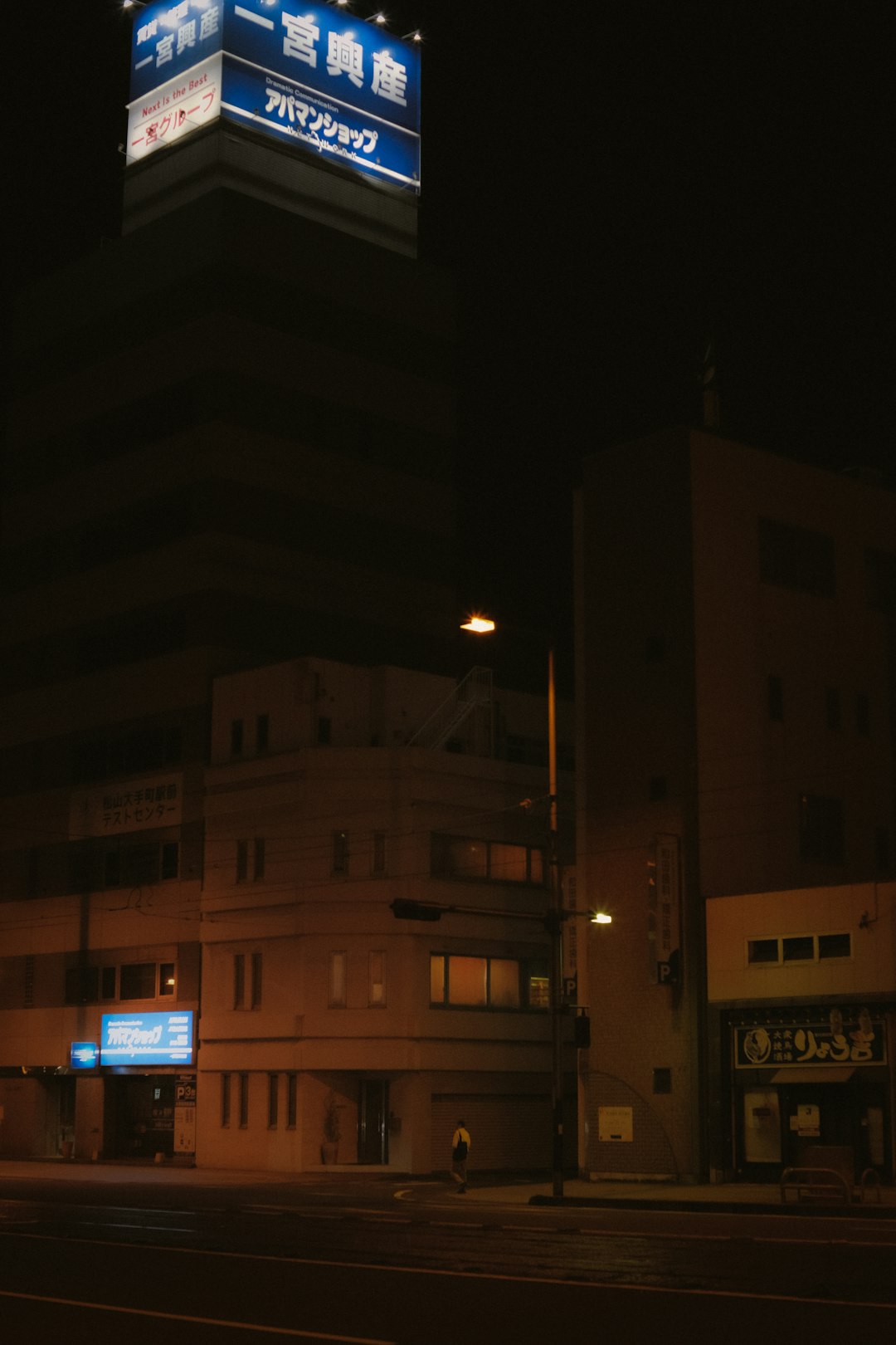 white and brown concrete building during nighttime