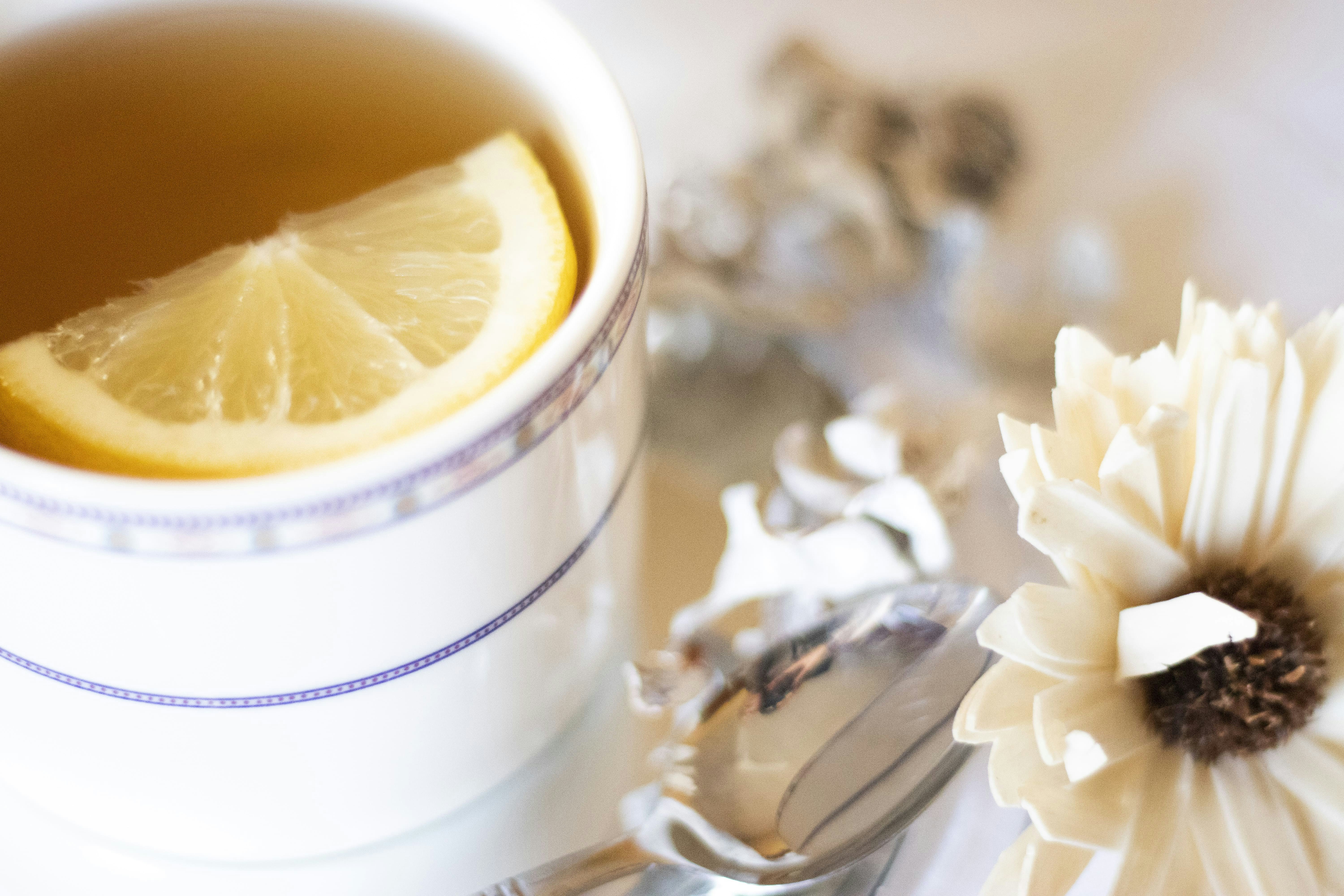 white ceramic mug with lemon juice