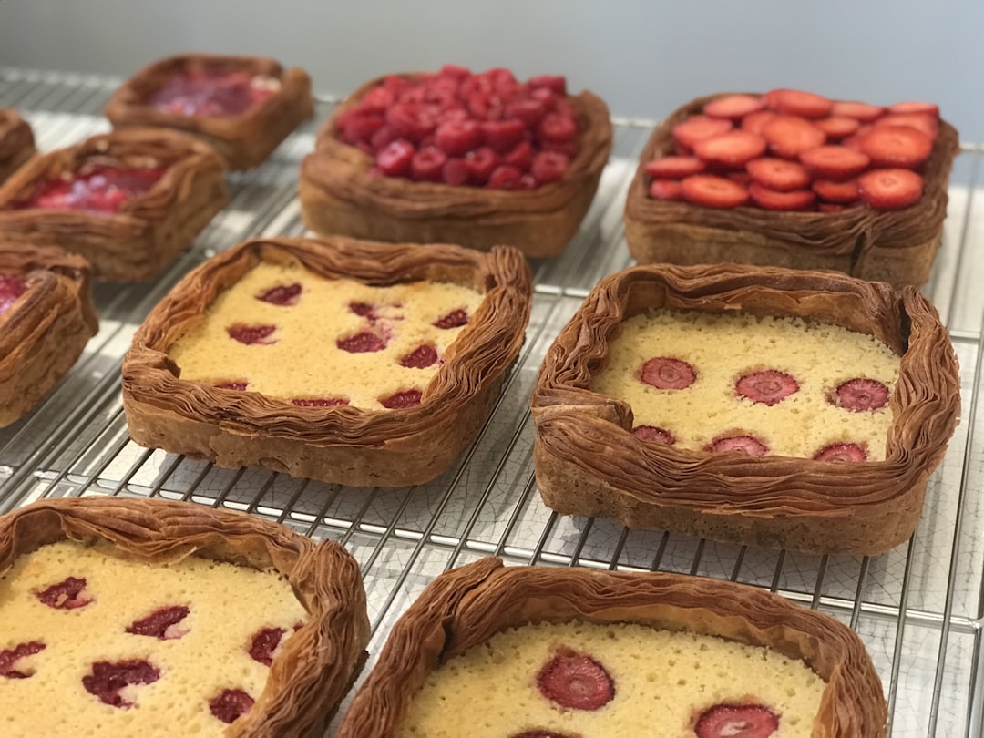 brown cupcakes on white tray, French pies