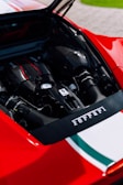 An elegant Ferrari engine being serviced.