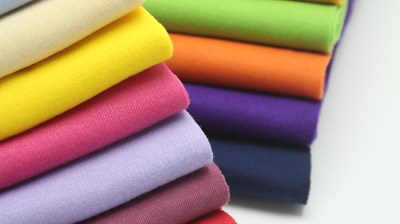 pile of multi colored textiles