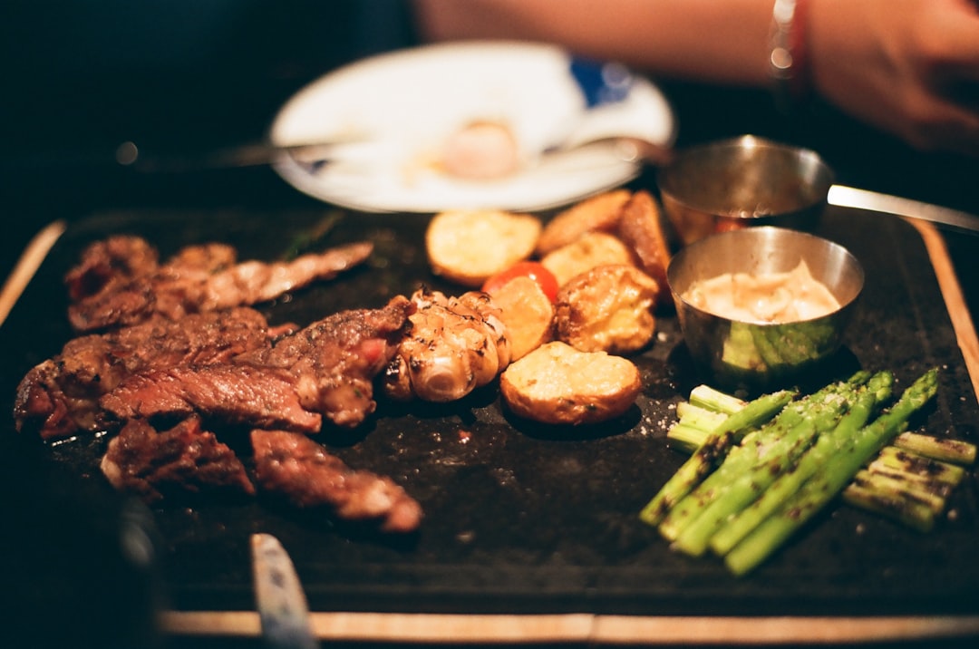 grilled meat on black plate