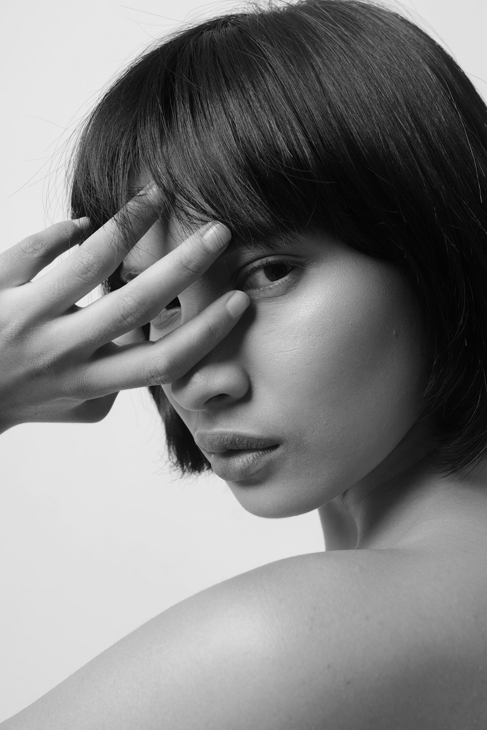 grayscale photo of womans face