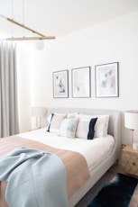 white and gray bed linen