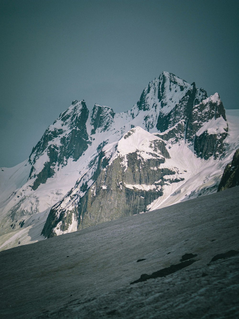 snow covered mountain during daytime