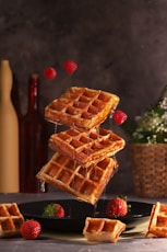 brown and red waffle on brown wooden table