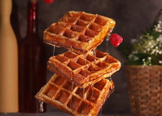 brown and red waffle on brown wooden table