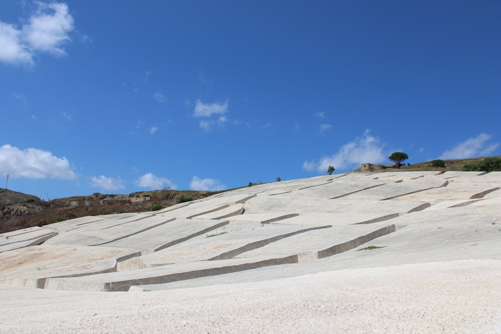 white sand under blue sky during daytime