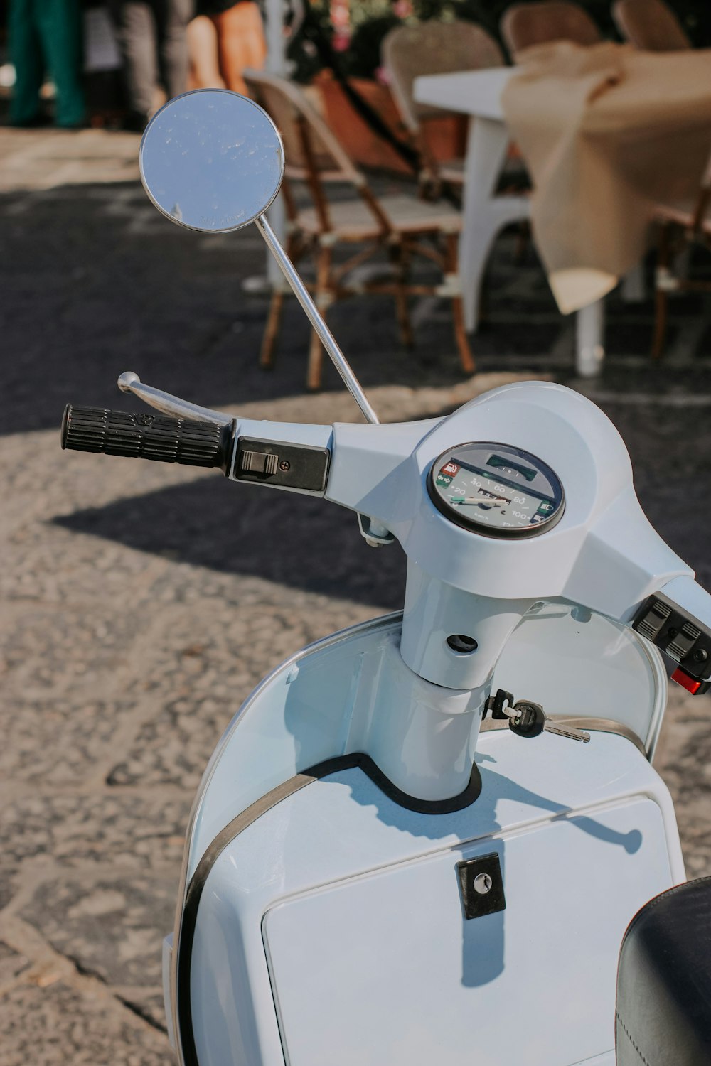 white and black motorcycle on brown sand during daytime