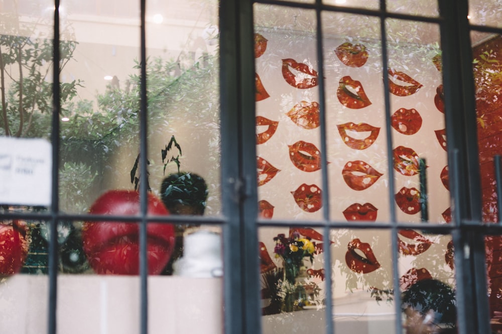 red round fruit on window