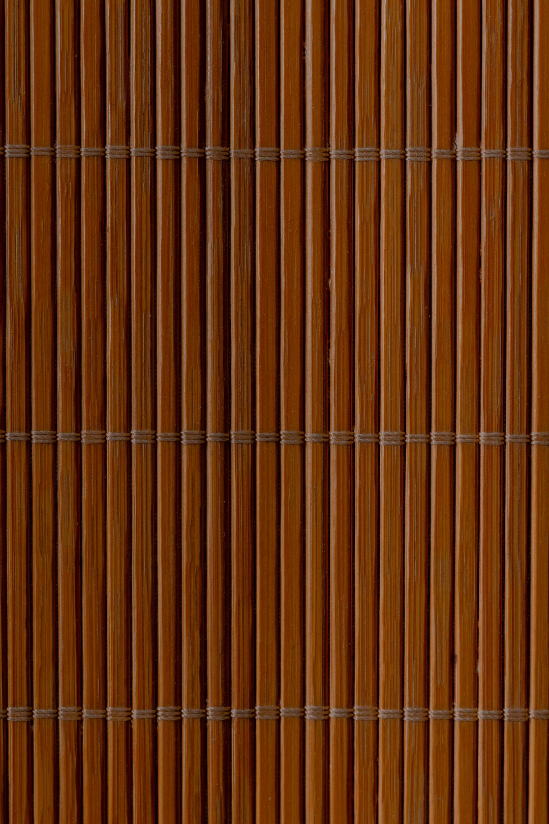 brown and white striped textile