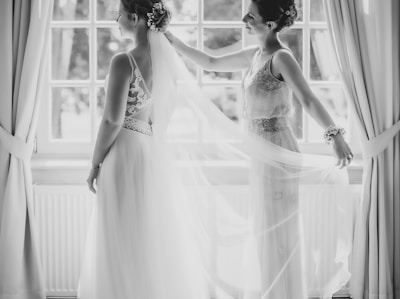 grayscale photo of woman in wedding dress