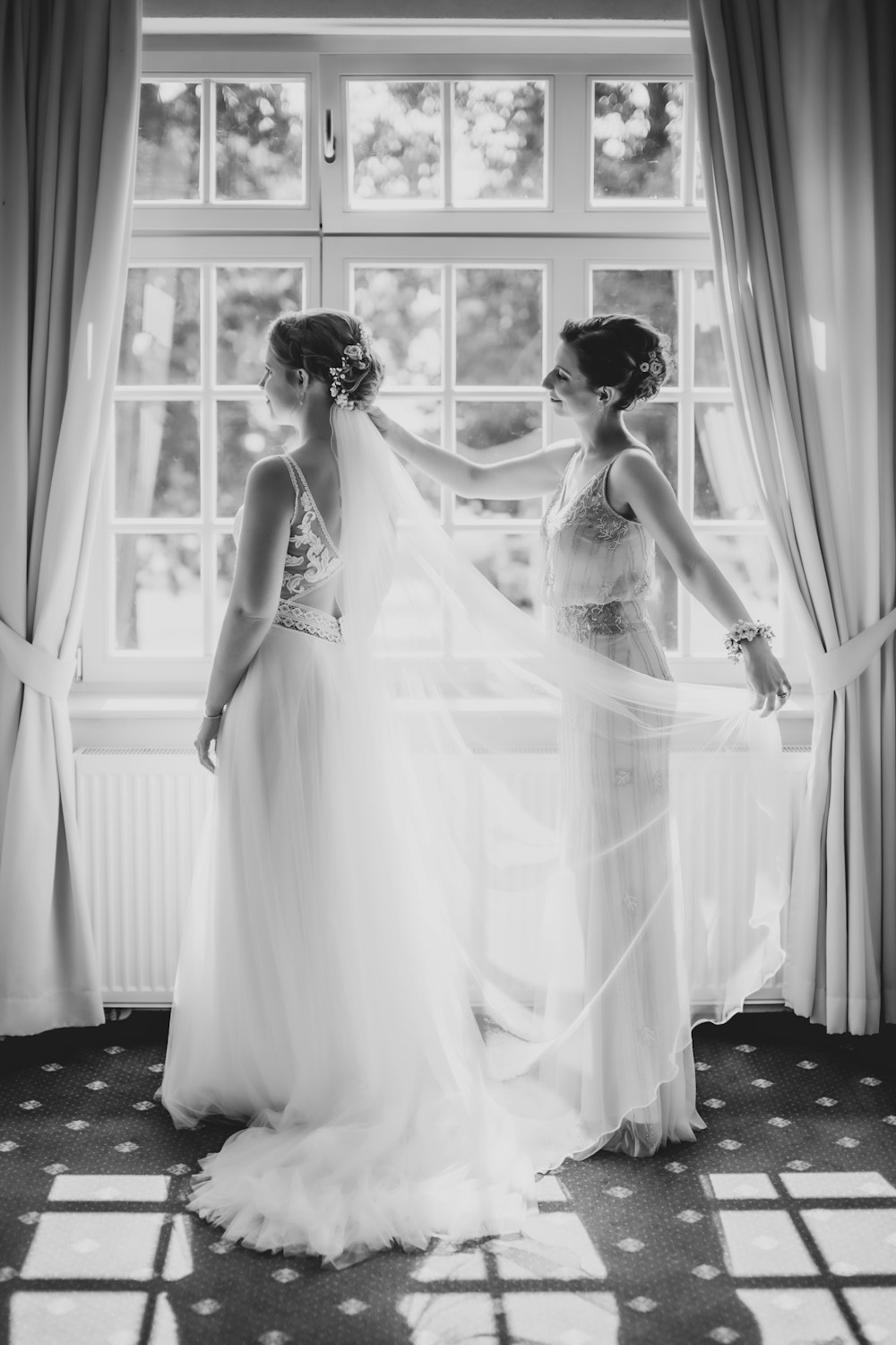 grayscale photo of woman in wedding dress