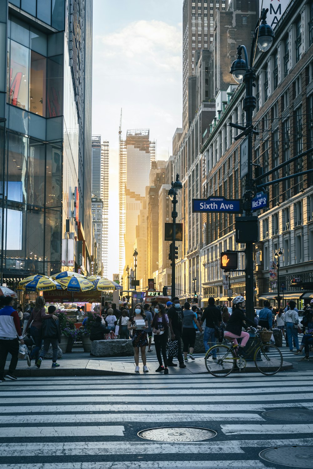 people walking on pedestrian lane during daytime