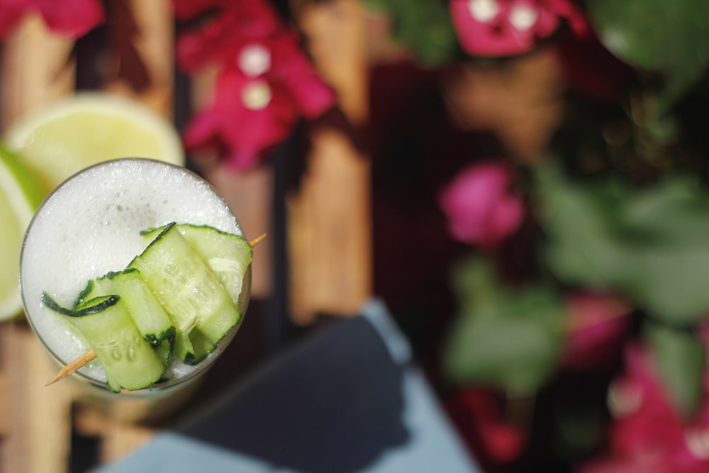 sliced cucumber on clear glass bowl