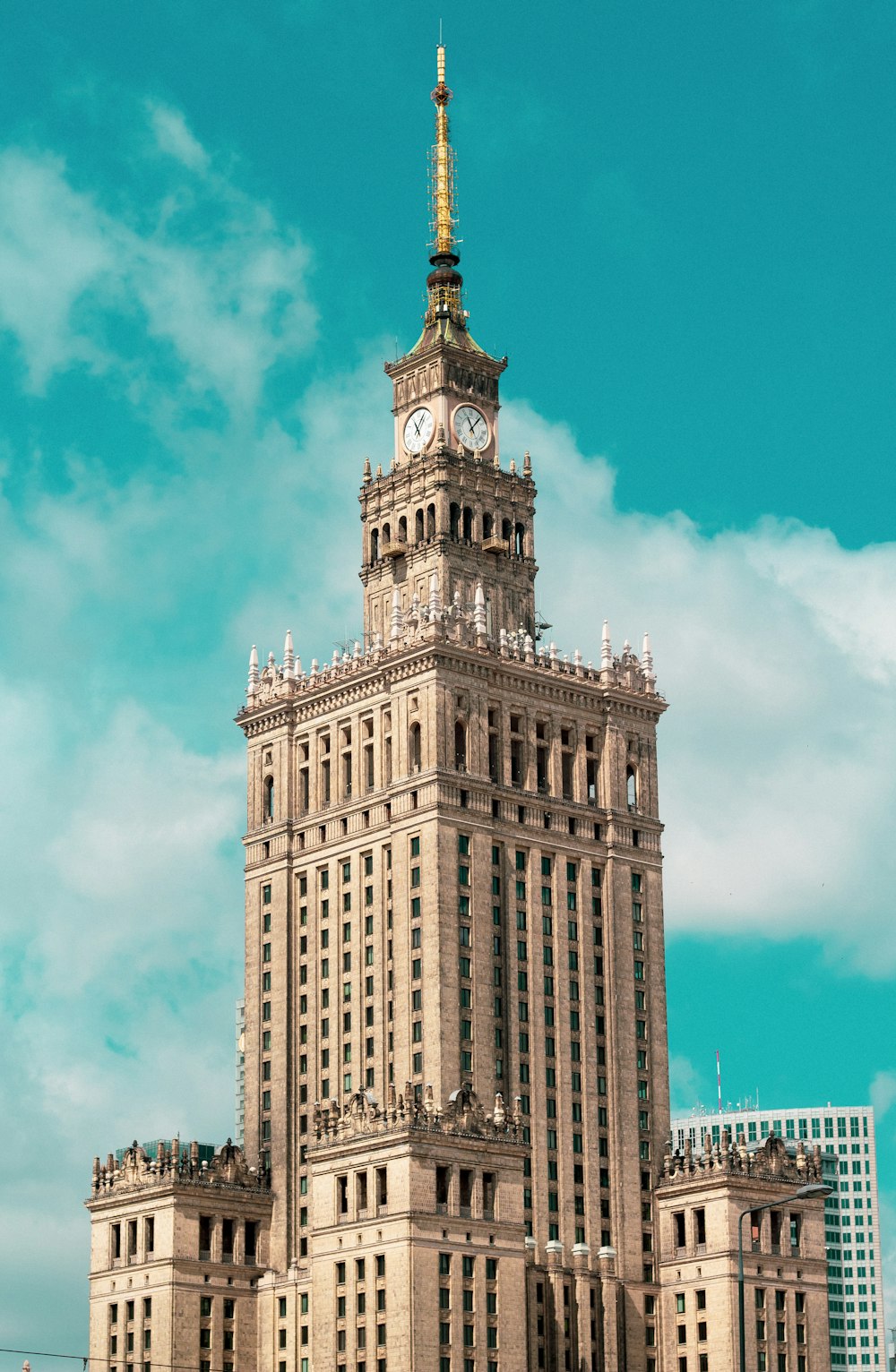 brown concrete building under blue sky during daytime