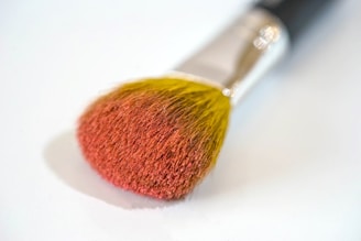 brown and silver makeup brush